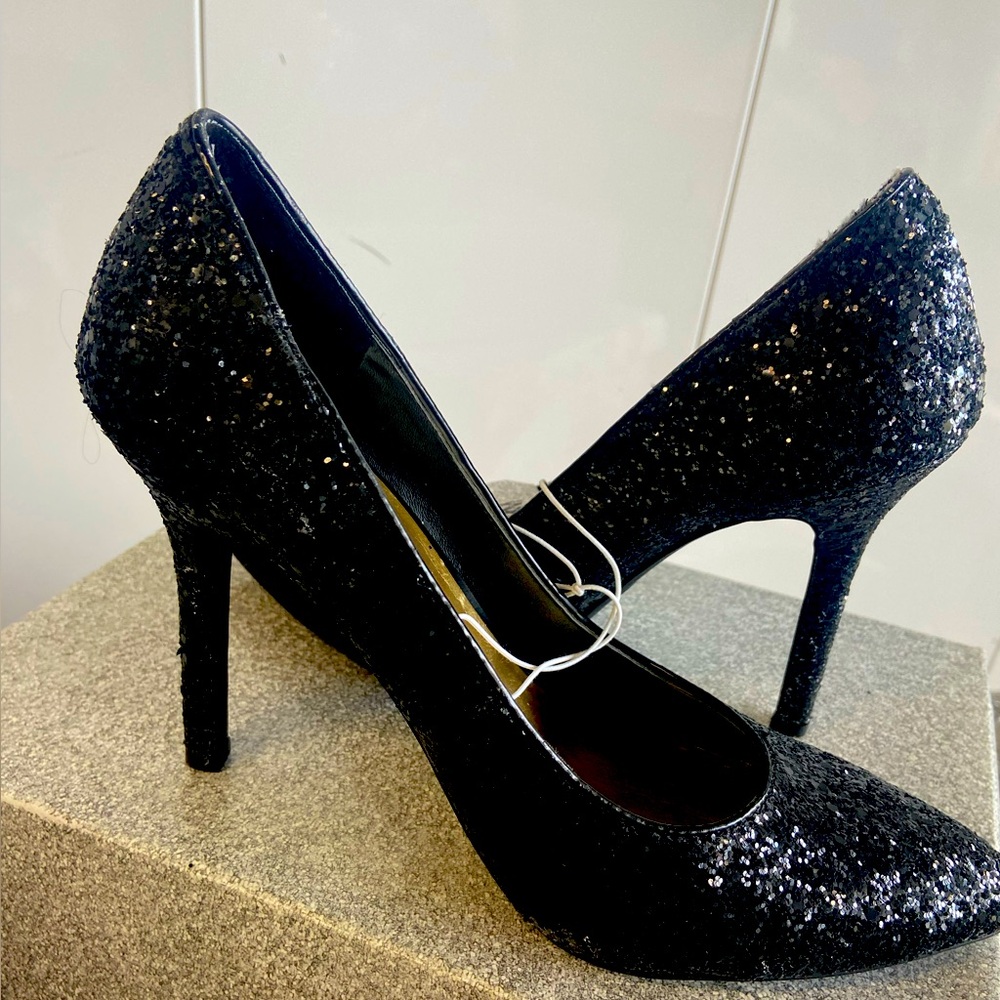 Beautiful black sequined heels. Never worn.